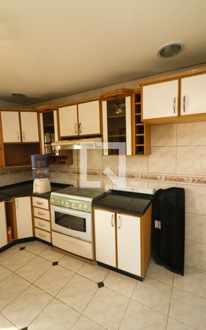 Casa à venda com 149m², 3 quartos e 2 vagas Casa à venda com 149m², 3 quartos e 2 vagasCozinha