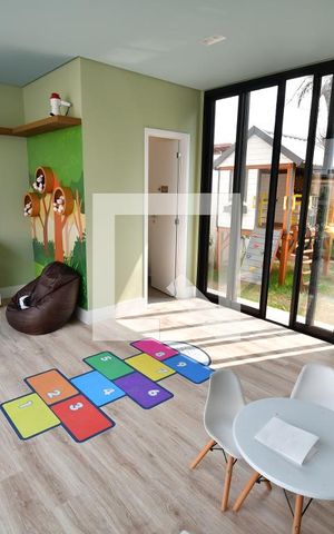 Casa de condomínio à venda com 85m², 2 quartos e 2 vagasÁrea comum - Brinquedoteca
