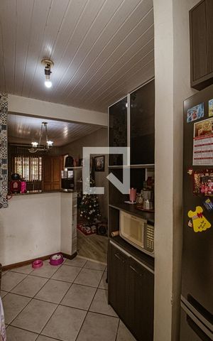 Casa à venda com 58m², 2 quartos e 2 vagas Casa à venda com 58m², 2 quartos e 2 vagasCozinha