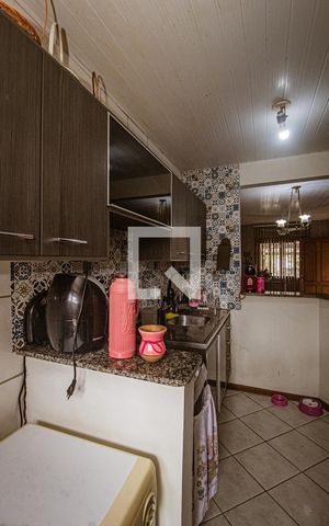 Casa à venda com 58m², 2 quartos e 2 vagas Casa à venda com 58m², 2 quartos e 2 vagasCozinha