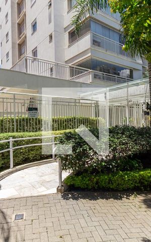 Apartamento à venda com 90m², 2 quartos e 2 vagasFachada + Plaquinha