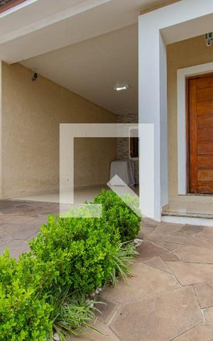 Casa à venda com 113m², 3 quartos e 2 vagas Casa à venda com 113m², 3 quartos e 2 vagasFachada