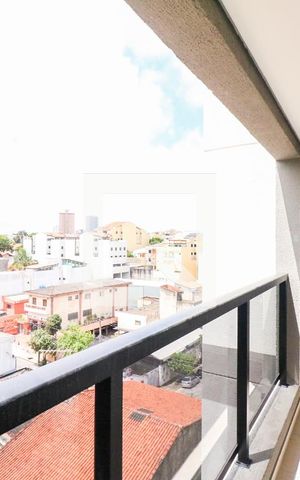 Apartamento à venda com 61m², 2 quartos e 1 vaga Apartamento à venda com 61m², 2 quartos e 1 vagaVaranda e Área de Serviço