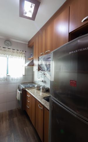 Casa à venda com 54m², 2 quartos e 2 vagas Casa à venda com 54m², 2 quartos e 2 vagasCozinha