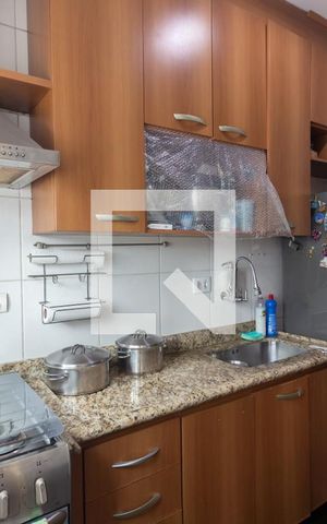 Casa à venda com 54m², 2 quartos e 2 vagas Casa à venda com 54m², 2 quartos e 2 vagasCozinha