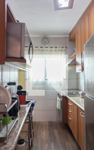 Casa à venda com 54m², 2 quartos e 2 vagas Casa à venda com 54m², 2 quartos e 2 vagasCozinha