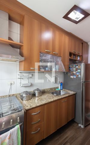 Casa à venda com 54m², 2 quartos e 2 vagas Casa à venda com 54m², 2 quartos e 2 vagasCozinha