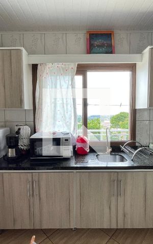 Casa à venda com 550m², 4 quartos e 2 vagas Casa à venda com 550m², 4 quartos e 2 vagasCozinha