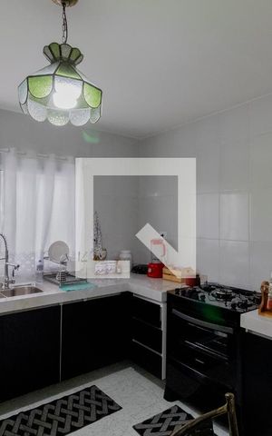 Casa à venda com 215m², 4 quartos e 2 vagas Casa à venda com 215m², 4 quartos e 2 vagasCasa 1 - Cozinha