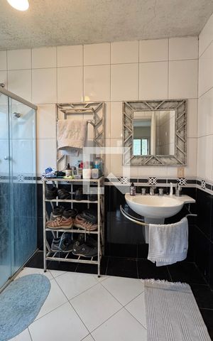 Casa de condomínio à venda com 450m², 4 quartos e 6 vagasBanheiro da Suíte 4