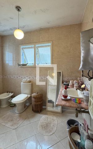 Casa de condomínio à venda com 450m², 4 quartos e 6 vagasBanheiro da Suíte 2
