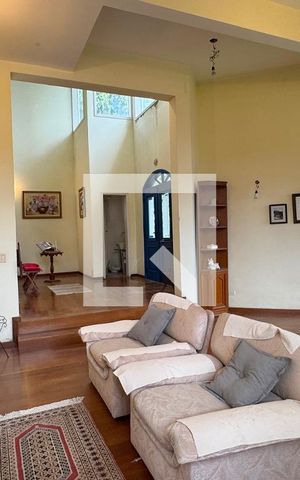 Casa de condomínio à venda com 450m², 4 quartos e 6 vagasSala