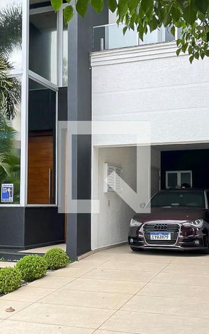 Casa de condomínio à venda com 420m², 3 quartos e 4 vagasFachada + plaquinha