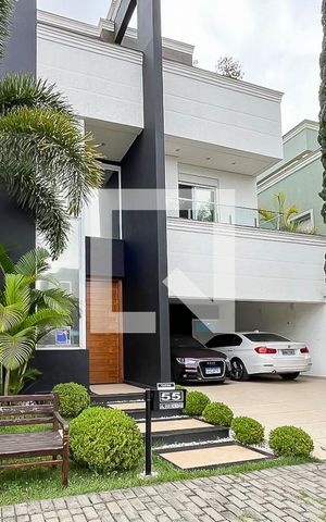 Casa de condomínio à venda com 420m², 3 quartos e 4 vagasFachada + plaquinha