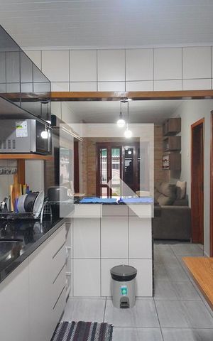 Casa à venda com 109m², 2 quartos e 2 vagas Casa à venda com 109m², 2 quartos e 2 vagasCozinha