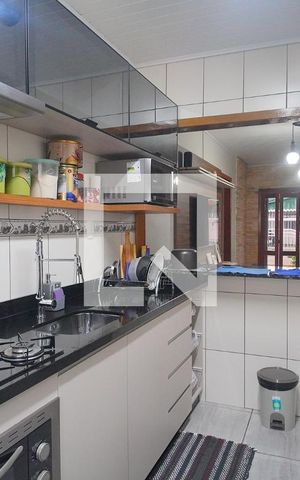 Casa à venda com 109m², 2 quartos e 2 vagas Casa à venda com 109m², 2 quartos e 2 vagasCozinha