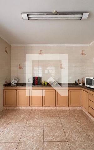Casa à venda com 219m², 4 quartos e 4 vagas Casa à venda com 219m², 4 quartos e 4 vagasCozinha