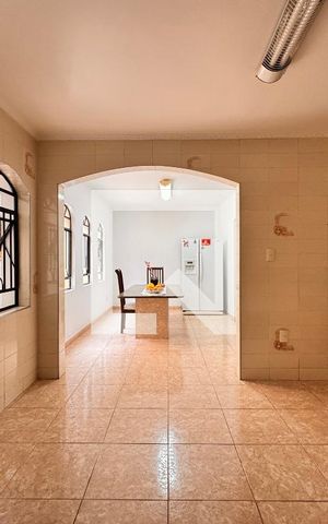 Casa à venda com 219m², 4 quartos e 4 vagas Casa à venda com 219m², 4 quartos e 4 vagasCozinha