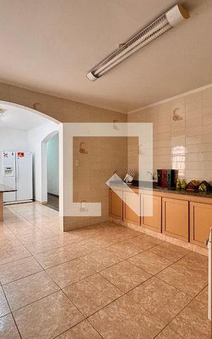 Casa à venda com 219m², 4 quartos e 4 vagas Casa à venda com 219m², 4 quartos e 4 vagasCozinha