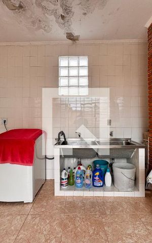 Casa à venda com 219m², 4 quartos e 4 vagas Casa à venda com 219m², 4 quartos e 4 vagasLavanderia