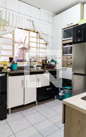 Casa à venda com 144m², 5 quartos e 2 vagas Casa à venda com 144m², 5 quartos e 2 vagasCozinha da Casa 2