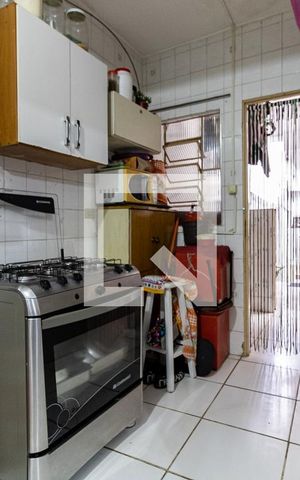 Casa à venda com 144m², 5 quartos e 2 vagas Casa à venda com 144m², 5 quartos e 2 vagasCozinha da Casa 3