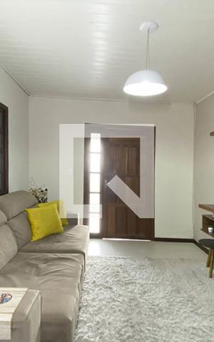 Casa à venda com 98m², 2 quartos e 2 vagasSala