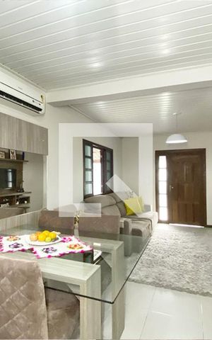 Casa à venda com 98m², 2 quartos e 2 vagasCozinha e Área de Serviço