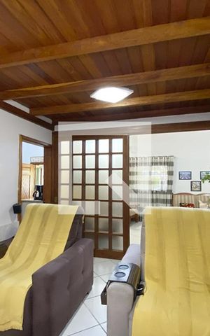 Casa à venda com 105m², 3 quartos e 2 vagasSala de TV