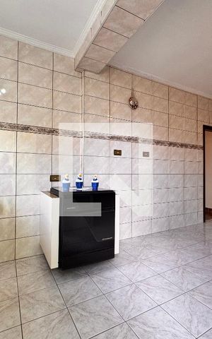 Casa à venda com 212m², 4 quartos e 2 vagas Casa à venda com 212m², 4 quartos e 2 vagasCozinha edícula