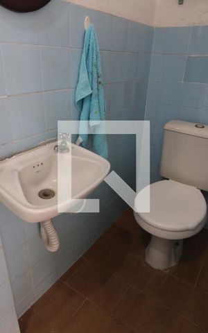 Casa de condomínio à venda com 251m², 4 quartos e 2 vagasBanheiro de Serviço da Área Externa