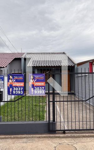 Casa à venda com 64m², 2 quartos e 2 vagas Casa à venda com 64m², 2 quartos e 2 vagasFachada