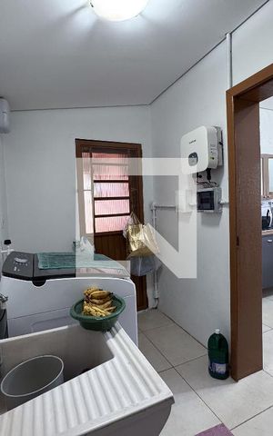 Casa à venda com 169m², 2 quartos e 2 vagas Casa à venda com 169m², 2 quartos e 2 vagasCozinha