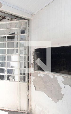 Casa à venda com 230m², 3 quartos e 4 vagasCozinha com Churrasqueira