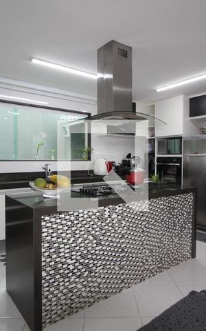 Casa de condomínio à venda com 560m², 4 quartos e 2 vagasCozinha