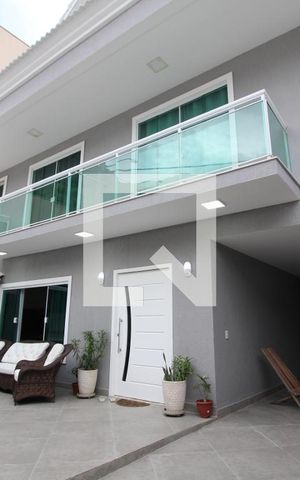 Casa de condomínio à venda com 560m², 4 quartos e 2 vagasFachada Interna