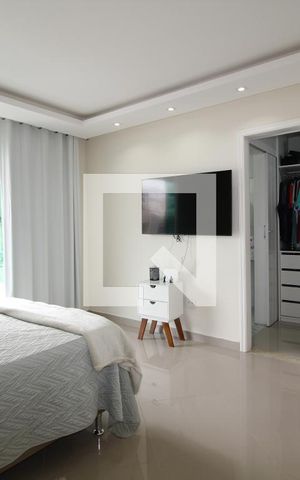 Casa de condomínio à venda com 560m², 4 quartos e 2 vagasSuíte 1