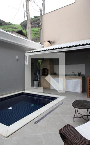 Casa de condomínio à venda com 560m², 4 quartos e 2 vagasÁrea Externa