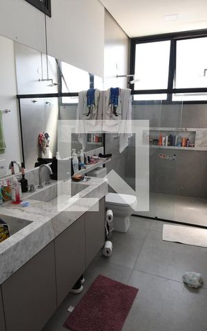 Casa de condomínio à venda com 265m², 4 quartos e 4 vagasBanheiro 4