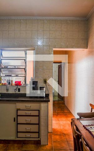 Casa à venda com 256m², 4 quartos e 1 vaga Casa à venda com 256m², 4 quartos e 1 vagaCozinha