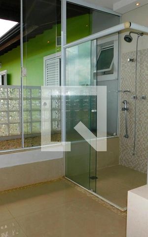 Casa de condomínio para alugar com 400m², 3 quartos e 4 vagasBanheiro 4