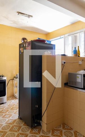 Casa à venda com 750m², 4 quartos e 5 vagas Casa à venda com 750m², 4 quartos e 5 vagasCozinha
