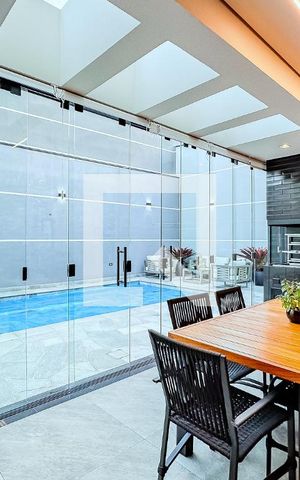 Casa à venda com 229m², 4 quartos e 4 vagas Casa à venda com 229m², 4 quartos e 4 vagasCozinha