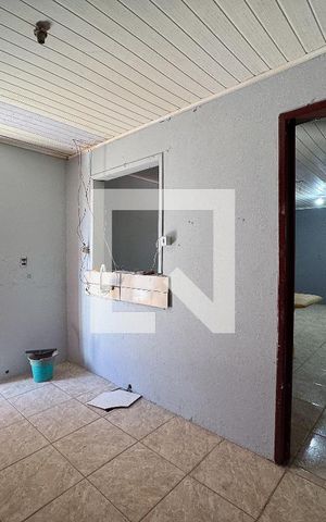 Casa à venda com 70m², 2 quartos e 2 vagas Casa à venda com 70m², 2 quartos e 2 vagasCozinha