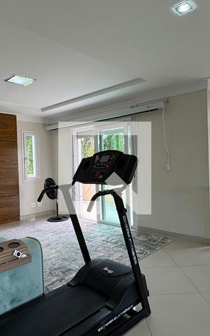Casa de condomínio para alugar com 350m², 3 quartos e 6 vagasSala de TV