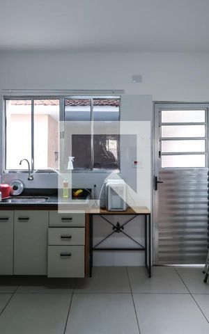 Casa à venda com 130m², 2 quartos e 2 vagas Casa à venda com 130m², 2 quartos e 2 vagasCozinha