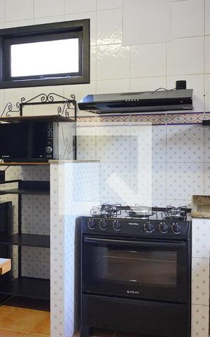 Casa de condomínio para alugar com 1000m², 3 quartos e 4 vagasCozinha