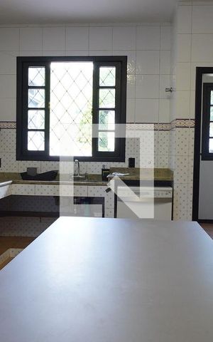Casa de condomínio para alugar com 1000m², 3 quartos e 4 vagasCozinha