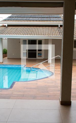 Casa de condomínio à venda com 394m², 4 quartos e 5 vagas Casa de condomínio à venda com 394m², 4 quartos e 5 vagasFACHADA FUNDOS