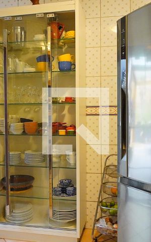 Casa de condomínio para alugar com 380m², 4 quartos e 6 vagasCozinha